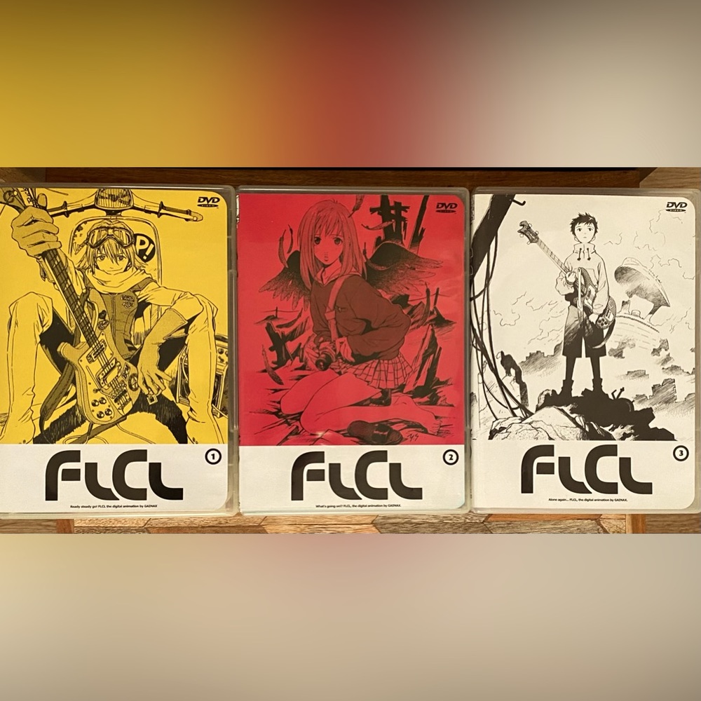 FLCL Season 1 Vol. 1 - 3 (Episodes 1-6) DVDs Excellent Used Condition 180 mins